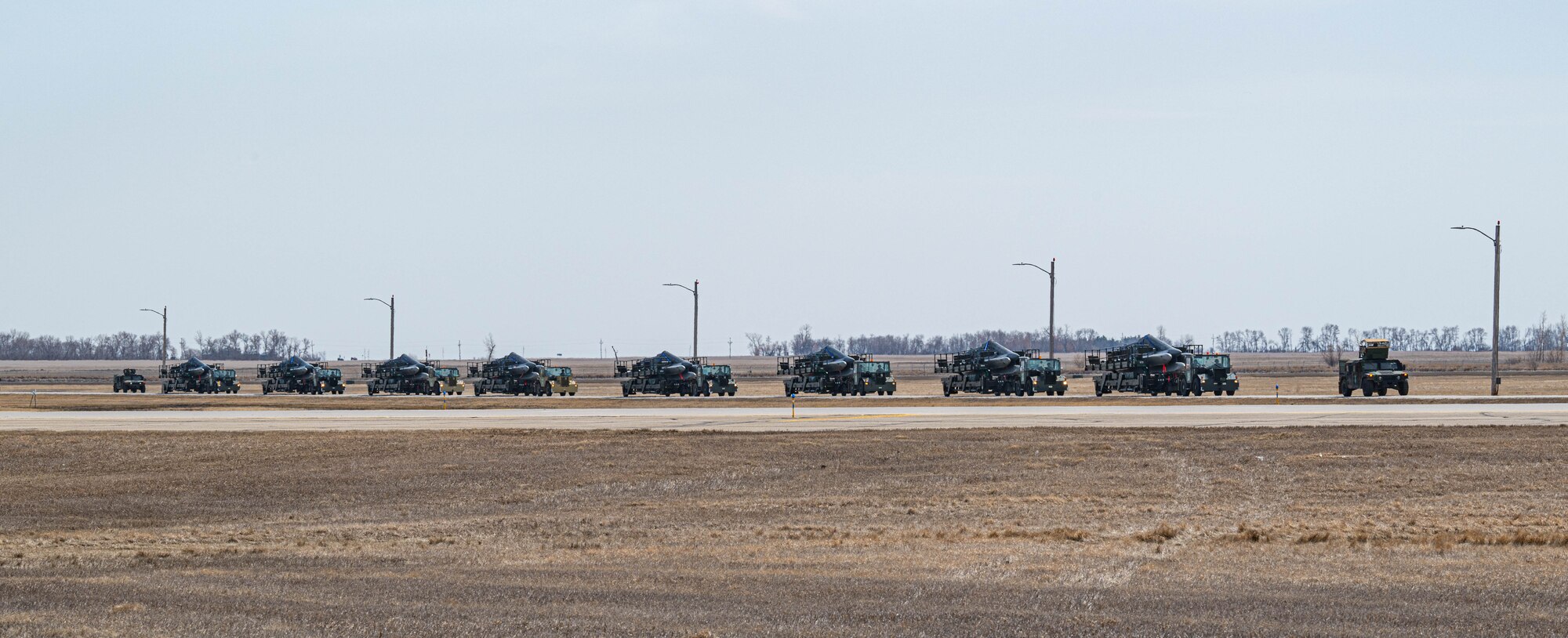 Airmen assigned to the 705th Munitions Squadron conduct convoy operations during Prairie Vigilance 24-3 at Minot Air Force Base, North Dakota, April 6, 2024. Prairie Vigilance serves to assure allies and partners that the U.S. is ready to execute nuclear operations and global strike anytime, anywhere, in order to deter and, if necessary, respond to strategic attack. (U.S. Air Force photo by Airman 1st Class Kyle Wilson)