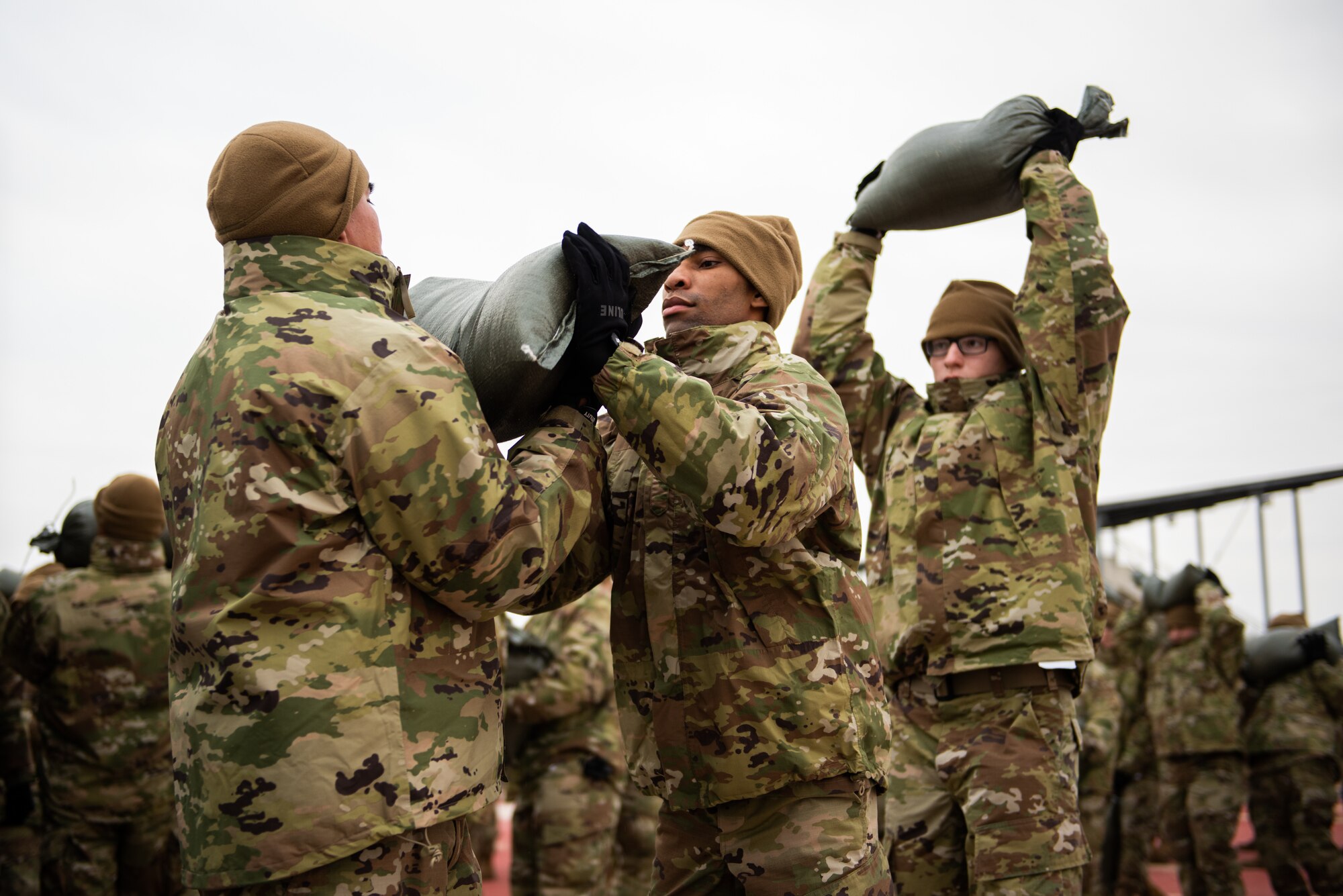 Basic Military Training trainees assigned to the 323rd Training Squadron, Joint Base San Antonio-Lackland, Texas, complete culminating events during Operation First Flight, day five of Zero Week on Jan. 20, 2024. Zero Week is the first five days of BMT where Military Training Instructors have the opportunity to optimize instruction before trainees are assigned to their BMT squadron. Zero Week serves as a deliberate process that not only assesses the initial competency and readiness of trainees but equips them with the essential tools needed to excel throughout their BMT journey.  (U.S. Air Force photo by Jonathan Cotto)