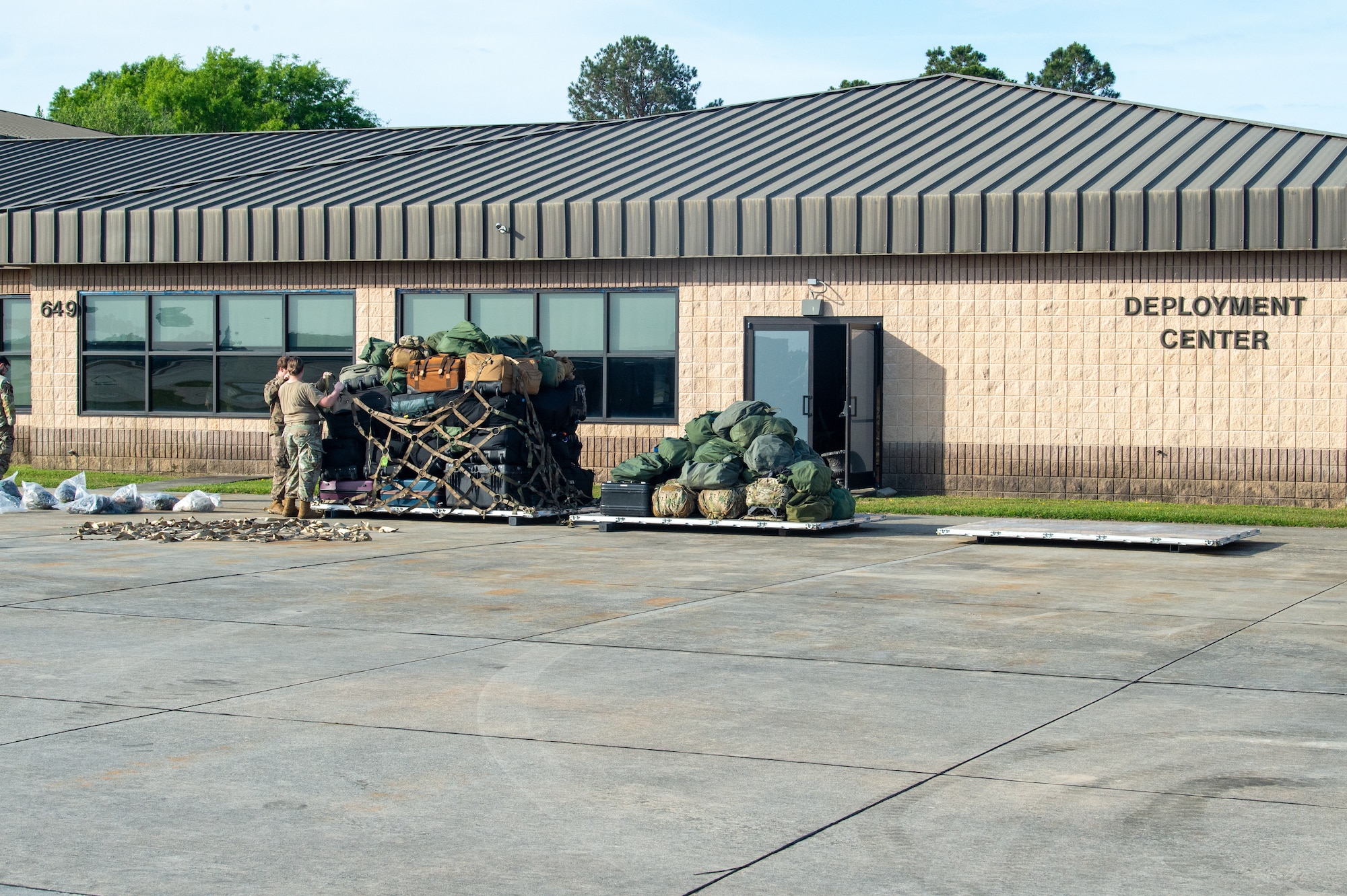 U.S. Air Force Airmen assigned to the 23rd Logistics Readiness Squadron palletize bags during Exercise Ready Tiger 24-1 at Moody Air Force Base, Georgia, April 8, 2024. Ready Tiger 24-1 is a readiness exercise demonstrating the 23rd Wing’s ability to plan, prepare and execute operations and maintenance to project air power in contested and dispersed locations, defending the United States’ interests and allies. (U.S. Air Force photo by Airman 1st Class Iain Stanley)