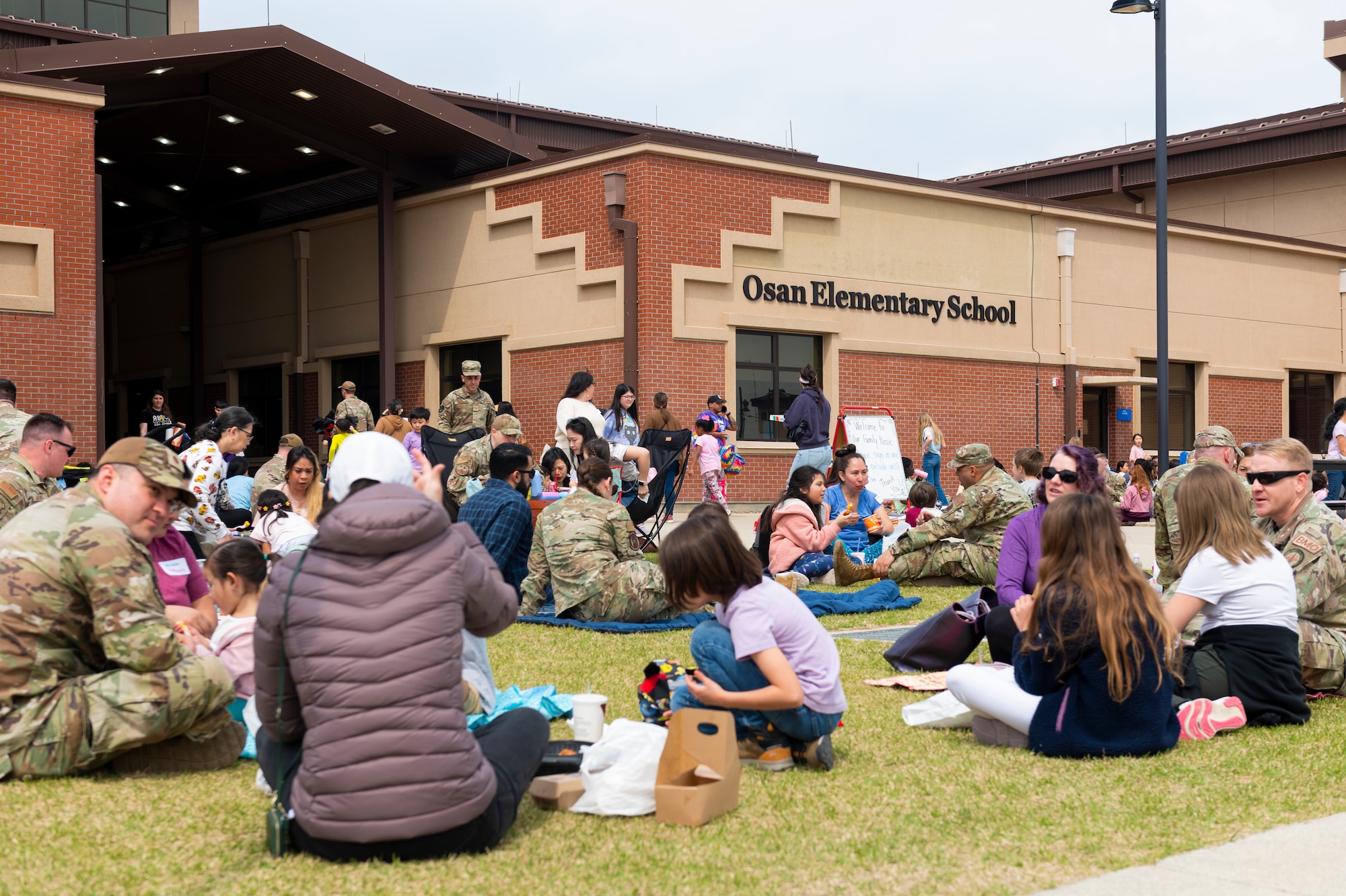 U.S. military members assigned to Osan Air Base and their families attend a Month of the Military Child picnic at Osan AB, Republic of Korea, April 10, 2024. Each year, MotMC acknowledges the resilience displayed by children within military families. (U.S. Air Force photo by Senior Airman Kaitlin Frazier)