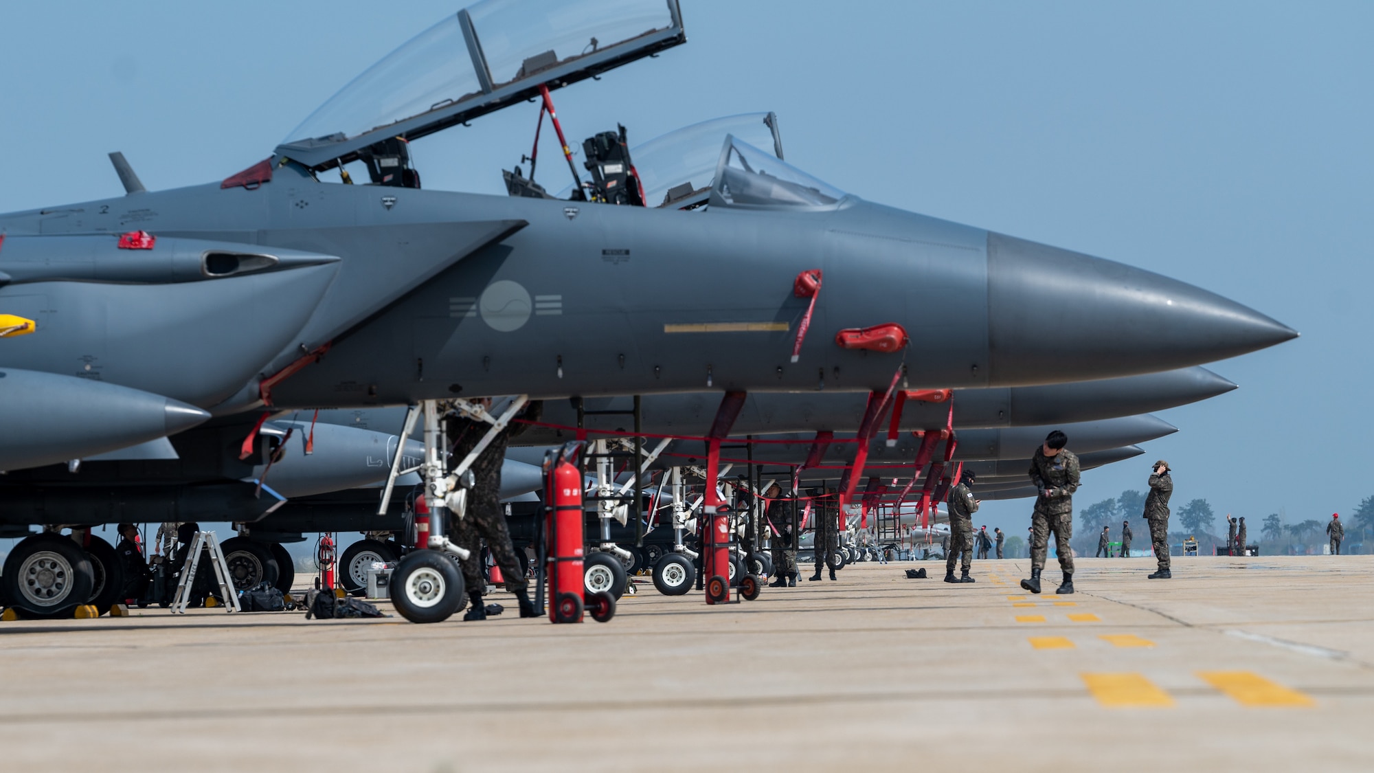 Members of the Republic of Korea Air Force conduct post-flight inspections after arriving for Korea Flying Training 2024.