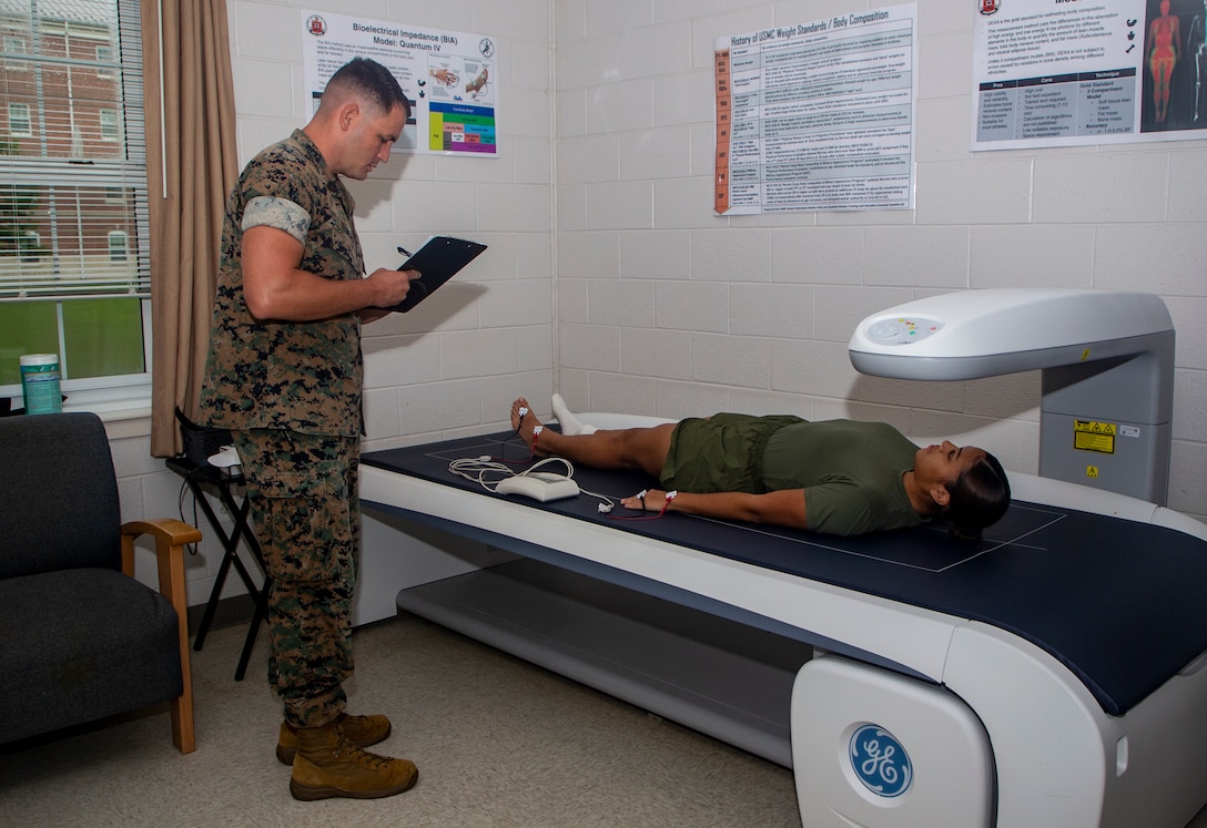 A U.S. Marine participates in a body composition assessment on Aug. 22, 2022 via bioelectrical impedance analysis scan at The Basic School on Marine Corps Base Quantico, Virginia. The Marine Corps recently changed body composition standards as a result of a year-long study conducted by the US Army Research Institute of Environmental Medicine. The study evaluated current body composition assessment methods to ensure service standards optimize health, performance, and fitness. Beginning January 1, 2023, Marine Corps units will utilize more accurate and unbiased method of body composition assessment prior to enrolling Marines in the body composition program. (U.S. Marine Corps Photo by Lance Cpl. George Nudo)