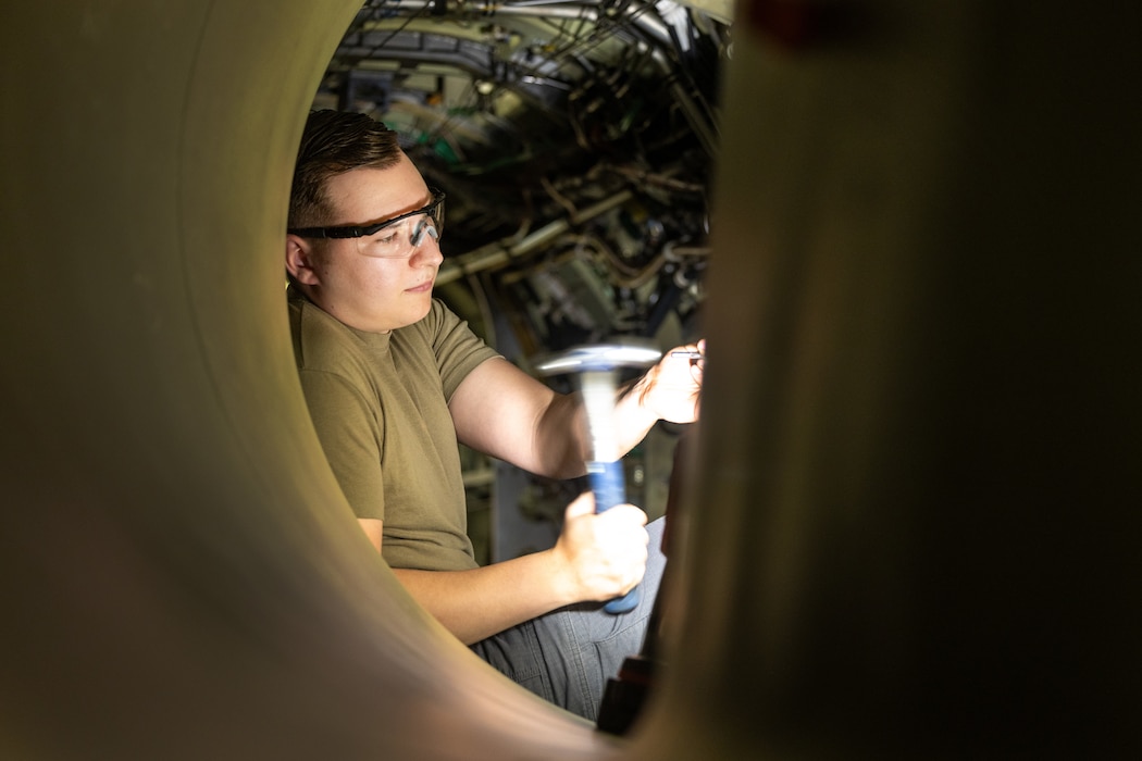 U.S. Air Force Senior Airman Trevor James, 9th Maintenance Squadron aircraft structural maintenance journeyman, uses a rivet tool on the inside of a U-2 Dragon Lady on Beale Air Force Base, California, Jan. 23, 2024.