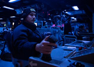 FC2 Nathan Ritchie stands watch aboard USS Dewey (DDG 105).