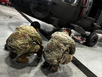 Virginia National Guard Soldiers conduct maintenance on a UH-60 Black Hawk helicopter April 2, 2024, at the Army Aviation Support Facility in Sandston, Virginia. The Soldiers are part of the AASF’s avionics shop, which troubleshoots, diagnoses and repairs avionic components and wiring on the VNG’s Black Hawk fleet. (U.S. Army National Guard photo by Sgt. 1st Class Terra C. Gatti)