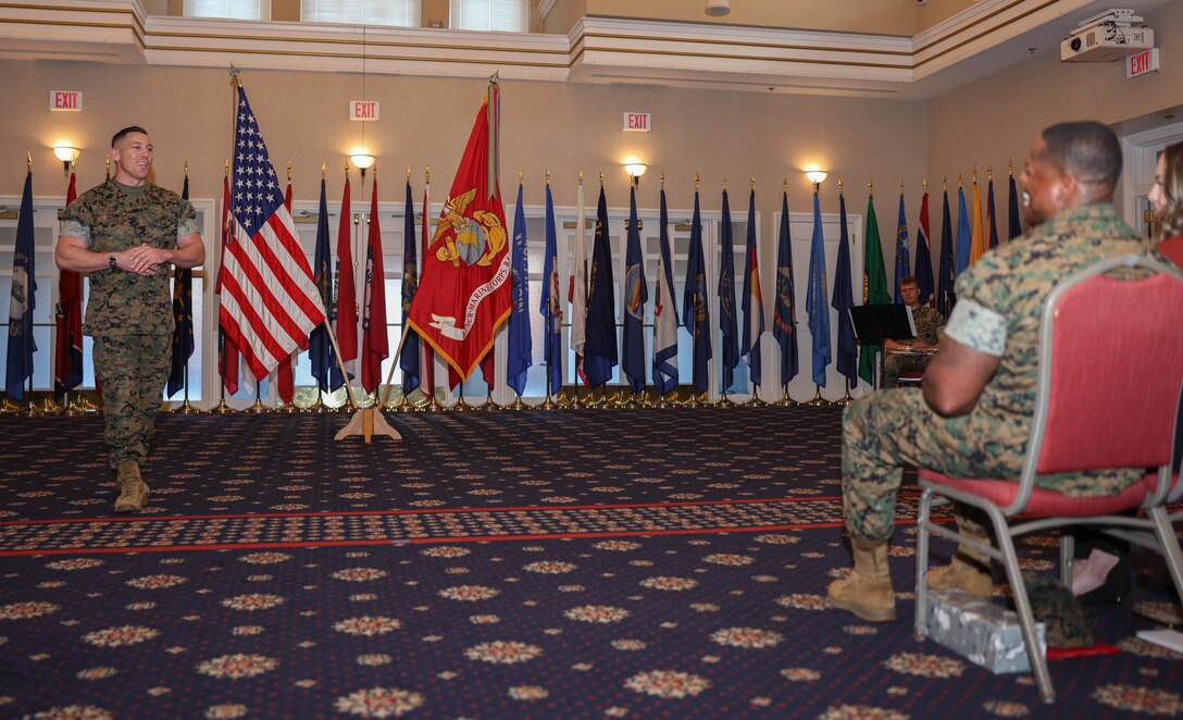 U.S. Marine Corps Sgt. Major Robert W. McLain, a Texas native and oncoming sergeant major of Security Battalion, addresses attendees to a Security Battalion Relief and Appointment ceremony at The Clubs at Quantico, Marine Corps Base Quantico, April 12, 2024. First Sgt. Orlando C. Freeman was relieved of his duties as sergeant major of Security Battalion during the Relief and Appointment ceremony. (U.S. Marine Corps photo by Lance Cpl. David Brandes)