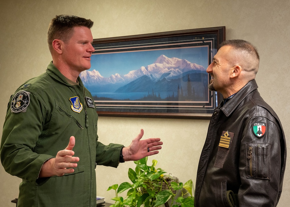 U.S. Air Force Col. Paul Townsend, 354th Fighter Wing commander, welcomes Italian Air Force Col. Vito Cracas, RED FLAG-Alaska Italian Detachment commander.