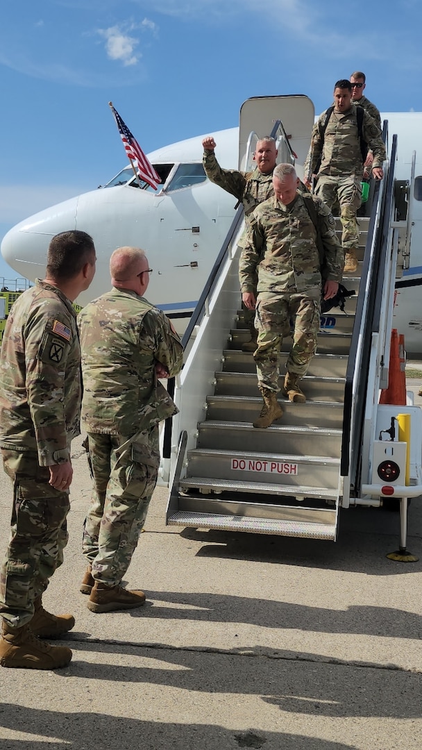 Members of Higher Headquarters Company 117th Military Police Brigade, Michigan National Guard, deplane at the unit’s welcome home ceremony from a deployment to support Joint Task Force Guantanamo Bay in the Southern Command Area of Responsibility, Detroit, Mich, April 9, 2024.