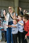 Capt. Nickolas Zappone, Higher Headquarters Company 117th Military Police Brigade, Michigan National Guard, is welcomed home by his wife, Sarah, and daughters Henly and Avery after a deployment to support Joint Task Force Guantanamo Bay in the Southern Command Area of Responsibility, Detroit, Mich., April 9, 2024.