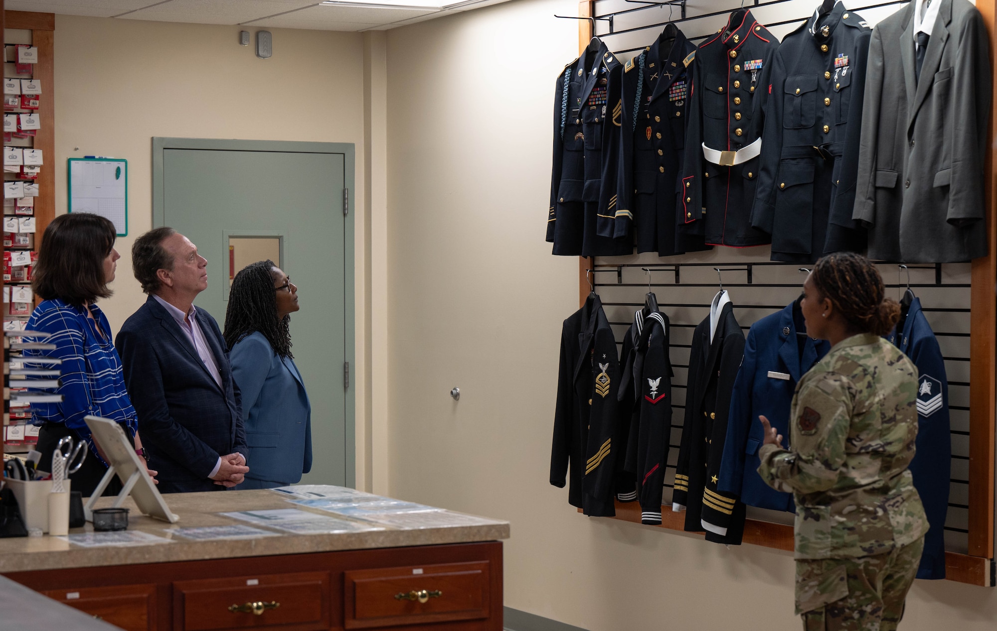A group of people receive a tour of AFMAO.