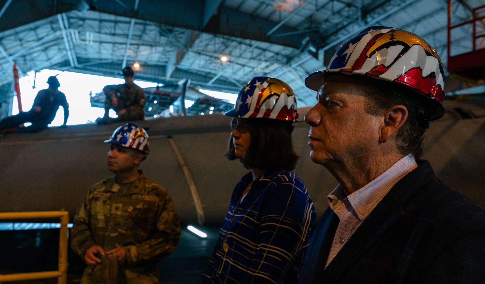 A group of people receive a tour.