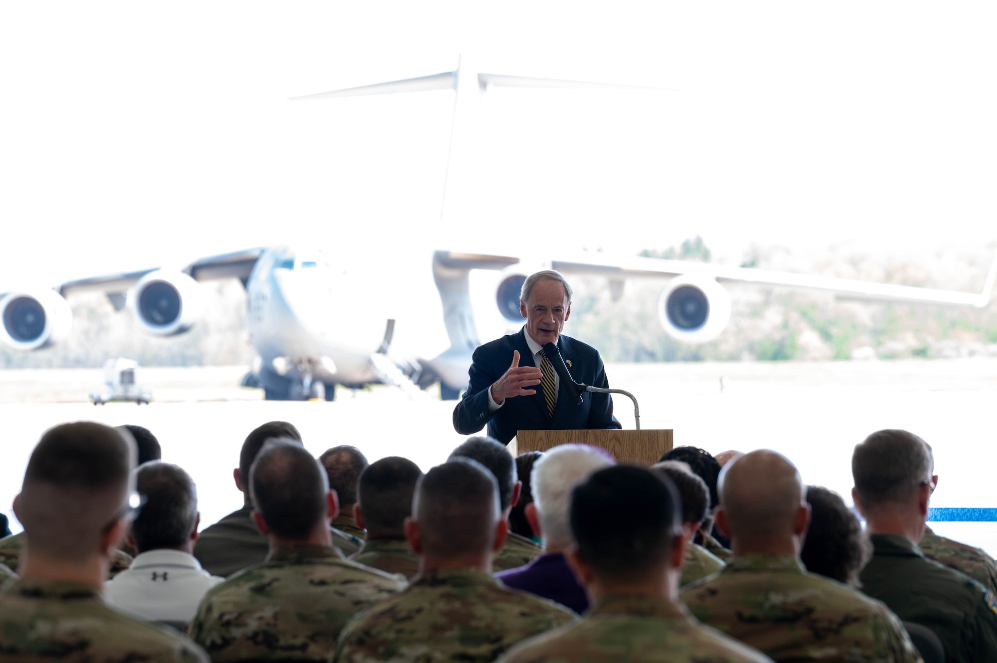 U.S. Sen. Tom Carper addresses Team Dover members during a ribbon-cutting ceremony at Dover Air Force Base, Delaware, April 15, 2024. The ceremony was held to celebrate the completion of the $45 million project, promoting Dover AFB’s dedication to innovation. (U.S. Air Force photo by Airman Liberty Matthews)