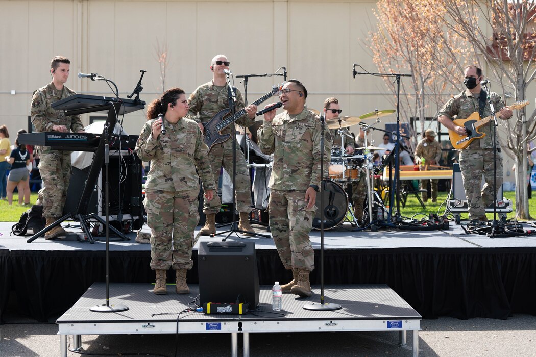 a military band plays during an event