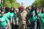 Maj. Gen. John C. Andonie, Commanding General (interim), D.C. National Guard, and the 257th Army Band joined Mayor Muriel Bowser for the 2024 Emancipation Day Parade and concert.  The event which commemorates the end of slavery is organized by the Mayor's Office of Community Affairs (MOCA).  On April 16, 1862, President Abraham Lincoln signed the District of Columbia Compensated Emancipation Act, ending slavery in the District of Columbia.  Passage of the law came over 8 months before President Lincoln issued his Emancipation Proclamation. (U.S. Air National Guard photo by Master Sgt. Arthur M. Wright)