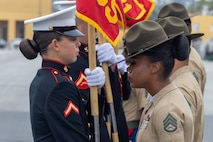 U.S. Marine serving as guides for their respective platoons with Mike Company, 3rd Recruit Training Battalion, retire the guidons during a graduation ceremony at Marine Corps Recruit Depot San Diego, California, April 12, 2024. Graduation took place at the completion of the 13- week transformation, which included training for drill, marksmanship, basic combat skills, and Marine Corps customs and traditions. (U.S. Marine Corps photo by Cpl. Alexander O. Devereux)