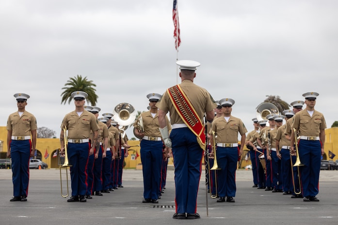 U.S. Marines with Marine Band San Diego, perform at a graduation ceremony for Mike Company, 3rd Recruit Training Battalion at Marine Corps Recruit Depot San Diego, California, April 12, 2024. Graduation took place at the completion of the 13-week transformation, which included training for drill, marksmanship, basic combat skills, and Marine Corps customs and traditions. (U.S. Marine Corps photo by Cpl. Alexander O. Devereux)