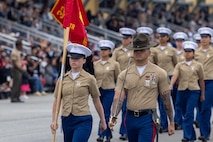 U.S. Marines from Mike Company, 3rd Recruit Training Battalion, march across the parade deck during their graduation ceremony at Marine Corps Recruit Depot San Diego, California, April 12, 2024. Graduation took place at the completion of the 13-week transformation, which included training for drill, marksmanship, basic combat skills, and Marine Corps customs and traditions. (U.S. Marine Corps photo by Cpl. Alexander O. Devereux)