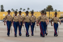 U.S. Marines from Recruit Training Regiment, march across the parade deck during a graduation ceremony for Mike Company, 3rd Recruit Training Battalion at Marine Corps Recruit Depot San Diego, California, April 12, 2024. Graduation took place at the completion of the 13-week transformation, which included training for drill, marksmanship, basic combat skills, and Marine Corps customs and traditions. (U.S. Marine Corps photo by Cpl. Alexander O. Devereux)
