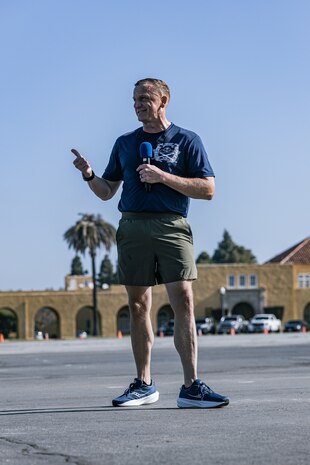 U.S. Marine Corps Lt. Col. Matthew Phelps, the commanding officer of 3rd Recruit Training Battalion, Recruit Training Regiment, speaks to the friends and families of the new Marines of Mike Company, 3rd Recruit Training Battalion at Marine Corps Recruit Depot San Diego, California, April 11, 2024. The company motivational run is the last physical training event the Marines will conduct before they graduate from MCRD San Diego. (U.S. Marine Corps photo by Sgt. Jesse K. Carter-Powell)