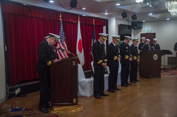 240412-N-YQ181-1019 YOKOSUKA, Japan (April 12, 2024) From right, Adm. John C. Aquilino, Commander, U.S. Indo-Pacific Command, Vice Adm. Fred Kacher, Commander, U.S. 7th Fleet, Rear Adm. Pat Hannifin, outgoing commander of Task Force (CTF) 70 and Carrier Strike Group 5, Rear Adm. Greg Newkirk, Commander, Task Force (CTF) 70 and Carrier Strike Group 5, listen to the benediction during the Commander, Task Force (CTF) 70 and Carrier Strike Group 5 change of command ceremony at U.S. Fleet Activities Yokosuka, April 12. CTF 70 is forward-deployed to the 7th Fleet area of operations in support of security and stability in the Indo-Pacific region. (U.S. navy photo by Mass Communication Specialist 2nd Class Askia Collins)