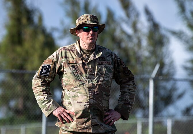 U.S. Air Force Staff Sgt. Troy Sebetich, a Heating, Ventilation and Air Conditioning specialist assigned to the 773d Expeditionary Civil Engineer Squadron out of Joint Base Elmendorf-Richardson, Alaska, conducts a site survey for base buildup during Exercise Agile Reaper 24-1 at Tinian Forward Operating Site, Northern Mariana Islands, April 8, 2024. AR 24-1 is a 3rd Wing-initiated exercise that focuses on Agile Combat Employment and employs a hub-and-spoke concept of operations with Tinian FOS serving as one of the four disaggregated spokes working under the hub situated at Andersen Air Force Base, Guam. The exercise employs combat-representative roles and processes to deliberately target all participants as a training audience and stress the force’s capability to generate combat air power in an expeditious manner across the Indo-Pacific Region. (U.S. Air Force photo by Tech. Sgt. Curt Beach)