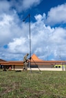 U.S. Air Force Tech. Sgt. Taylor Vaughan, 673d Expeditionary Communications Squadron NCOIC of agile communications operations, assembles a BlueSky Mast to enable air-to-ground communications during Exercise Agile Reaper 24-1 at Tinian Forward Operating Site, Northern Mariana Islands, April 9, 2024. AR 24-1 is a 3rd Wing-initiated exercise that focuses on Agile Combat Employment and employs a hub-and-spoke concept of operations with Tinian FOS serving as one of the four disaggregated spokes working under the hub situated at Andersen Air Force Base, Guam. The exercise employs combat-representative roles and processes to deliberately target all participants as a training audience and stress the force’s capability to generate combat air power in an expeditious manner across the Indo-Pacific Region. (U.S. Air Force photo by Tech. Sgt. Curt Beach)