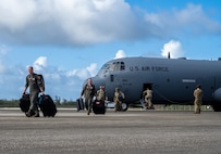 U.S. Air Force Airmen assigned to the 3rd Air Expeditionary Wing out of Joint Base Elmendorf-Richardson, Alaska, deplane a U.S. Air Force C-130 Hercules during Exercise Agile Reaper 24-1 at Tinian Forward Operating Site, Northern Mariana Islands, April 9, 2024. AR 24-1 is a 3rd Wing-initiated exercise that focuses on Agile Combat Employment and employs a hub-and-spoke concept of operations with Tinian FOS serving as one of the four disaggregated spokes working under the hub situated at Andersen Air Force Base, Guam. The exercise employs combat-representative roles and processes to deliberately target all participants as a training audience and stress the force’s capability to generate combat air power in an expeditious manner across the Indo-Pacific Region. (U.S. Air Force photo by Tech. Sgt. Curt Beach)