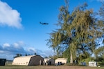 After delivering personnel and cargo in support of Exercise Agile Reaper 24-1, a C-130 Hercules from Yokota Air Base Japan, departs Tinian Forward Operating Site, Northern Mariana Islands, April 9, 2024. AR 24-1 is a 3rd Wing-initiated exercise that focuses on Agile Combat Employment and employs a hub-and-spoke concept of operations with Tinian FOS serving as one of the four disaggregated spokes working under the hub situated at Andersen Air Force Base, Guam. The exercise employs combat-representative roles and processes to deliberately target all participants as a training audience and stress the force’s capability to generate combat air power in an expeditious manner across the Indo-Pacific Region. (U.S. Air Force photo by Tech. Sgt. Curt Beach)
