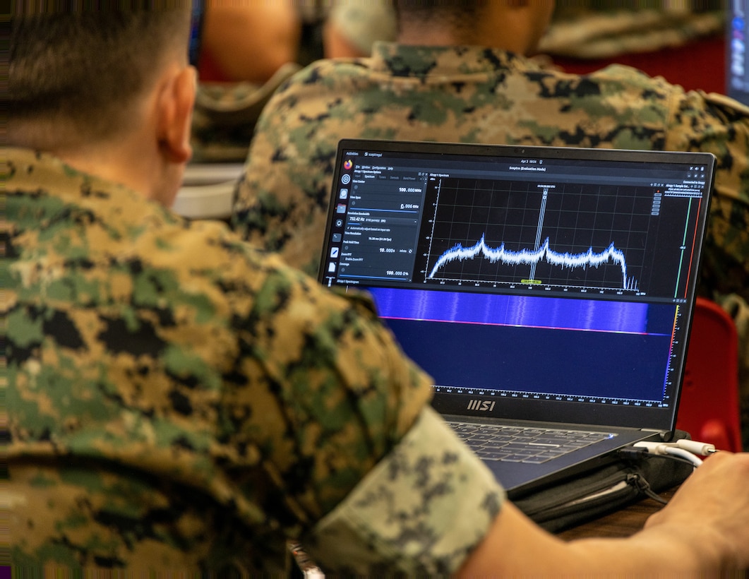 A U.S. Marine with 3rd Radio Battalion, III Marine Expeditionary Force Information Group, utilizes 3dB Labs SCEPTRE software during a training event held by Metrea Spectrum Operations at Marine Corps Base Hawaii on April 3, 2024. The training served to familiarize Marines on collecting reports and analyzing signals while tracking friendly team movements and simulated enemy positions as a part of exercise Corvus Dawn 24 battalion operations. CD24 sharpened 3rd RADBN's ability to provide technical information related capabilities to III Marine Expeditionary Force and the joint and multi-national force throughout the Indo-Pacific region. (U.S. Marine Corps photo by Staff Sgt. Samuel Ruiz)