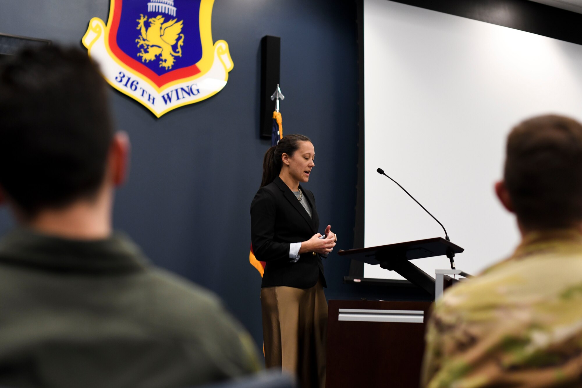 Dr. Sarah Barksdale, 316th Wing historian, shares the history of the 1st Helicopter Squadron for the 80th anniversary event at Joint Base Andrews, Md., April 11, 2024.