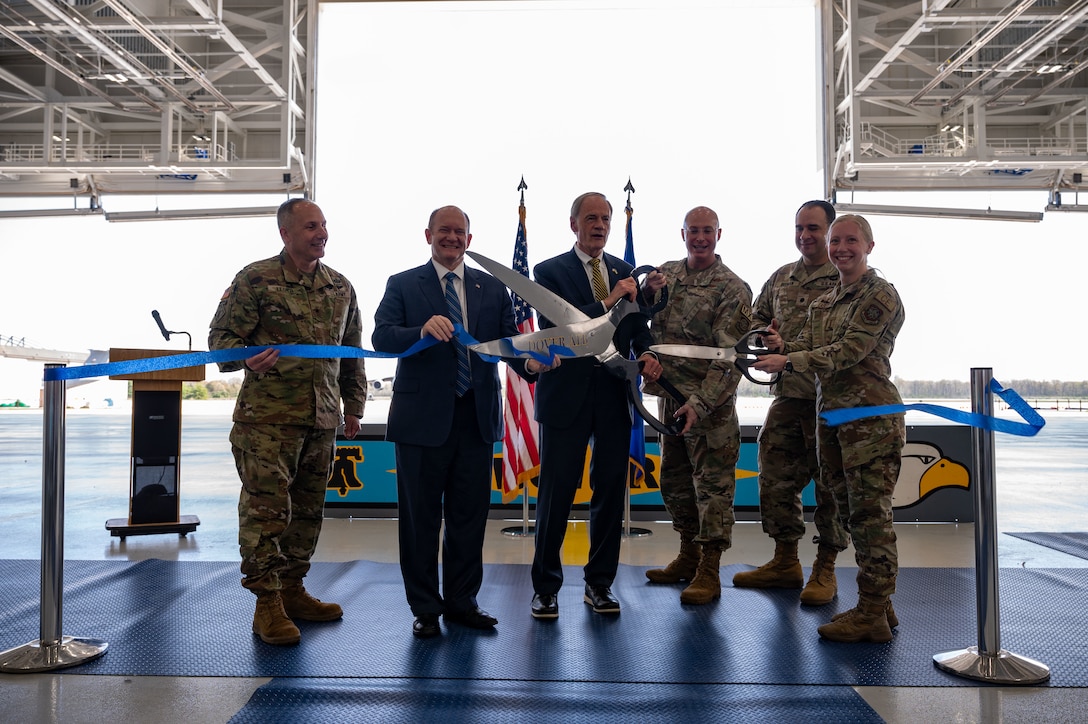 Team Dover leadership and community partners pose for a photo during the ribbon-cutting ceremony at Dover Air Force Base, Delaware, April 15, 2024. The ceremony was held to celebrate the completion of the $45 million project, promoting Dover AFB’s dedication to innovation. (U.S. Air Force photo by Airman 1st Class Amanda Jett)