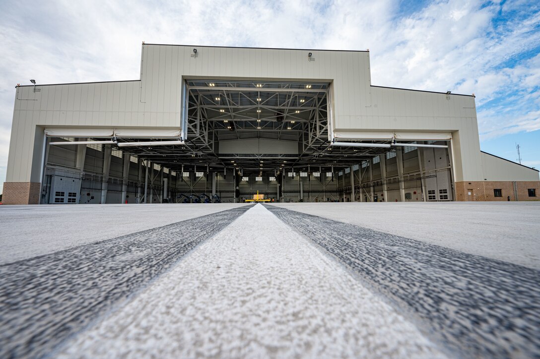 Hangar 916 opens its doors for the ribbon-cutting ceremony at Dover Air Force Base, Delaware, April 15, 2024. The ceremony was held to celebrate the completion of the $45 million project, promoting Dover AFB’s dedication to innovation. (U.S. Air Force photo by Airman 1st Class Amanda Jett)