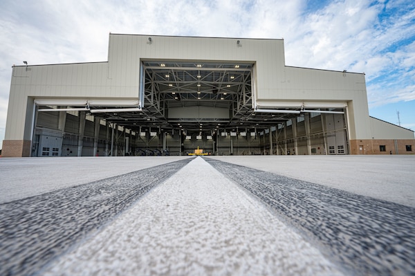 Hangar 916 opens its doors for the ribbon-cutting ceremony at Dover Air Force Base, Delaware, April 15, 2024. The ceremony was held to celebrate the completion of the $45 million project, promoting Dover AFB’s dedication to innovation. (U.S. Air Force photo by Airman 1st Class Amanda Jett)