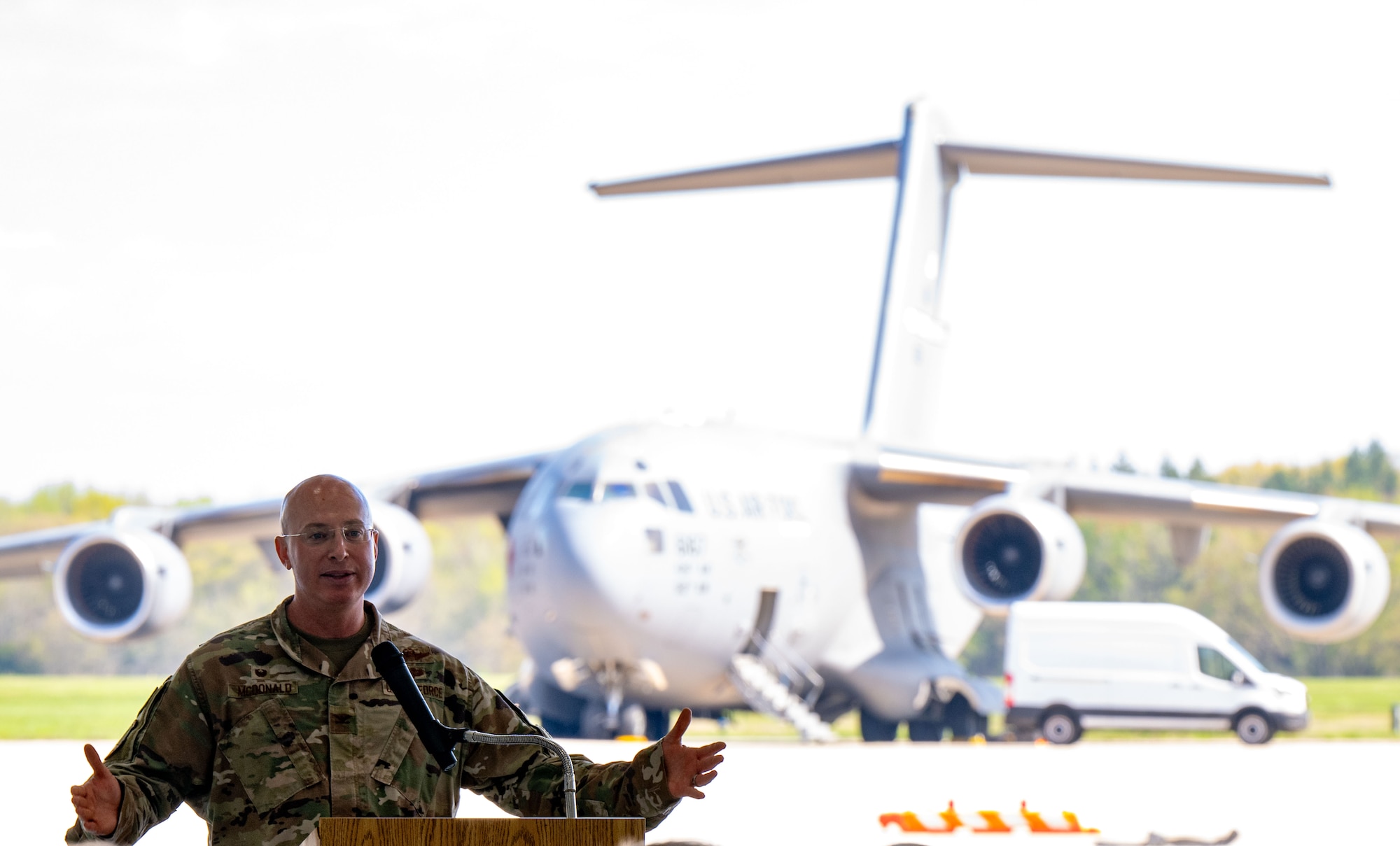 U.S. Air Force Col. Chris McDonald, 436th Airlift Wing commander, gives opening remarks during a ribbon cutting ceremony at Dover Air Force Base, Delaware, April 15, 2024. The ceremony was held to celebrate the completion of the $45 million project, promoting Dover AFB’s dedication to innovation. (U.S. Air Force photo by Airman 1st Class Amanda Jett)