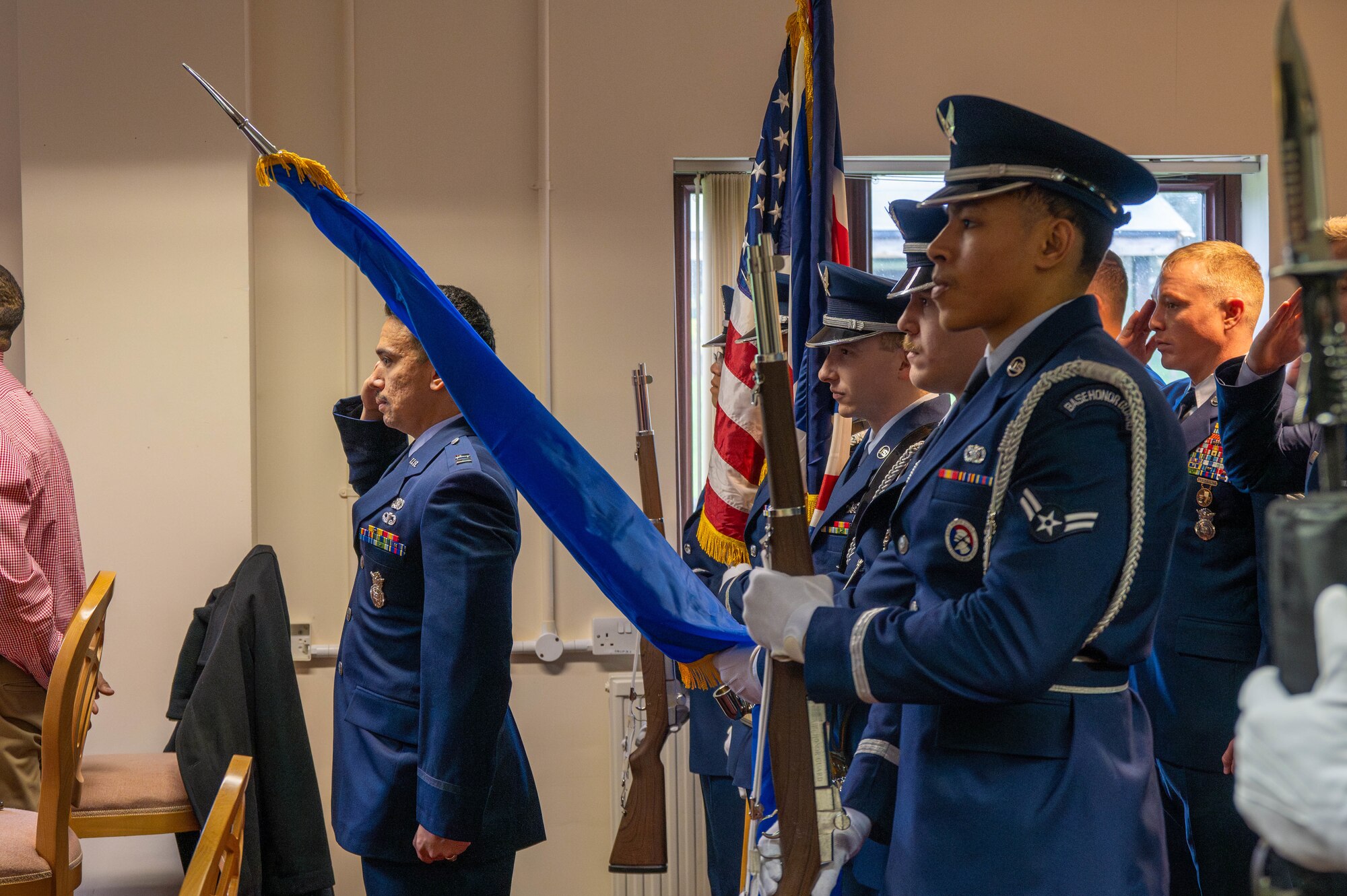 Members of the 501st Combat Support Wing stand in formation during a memorial service.