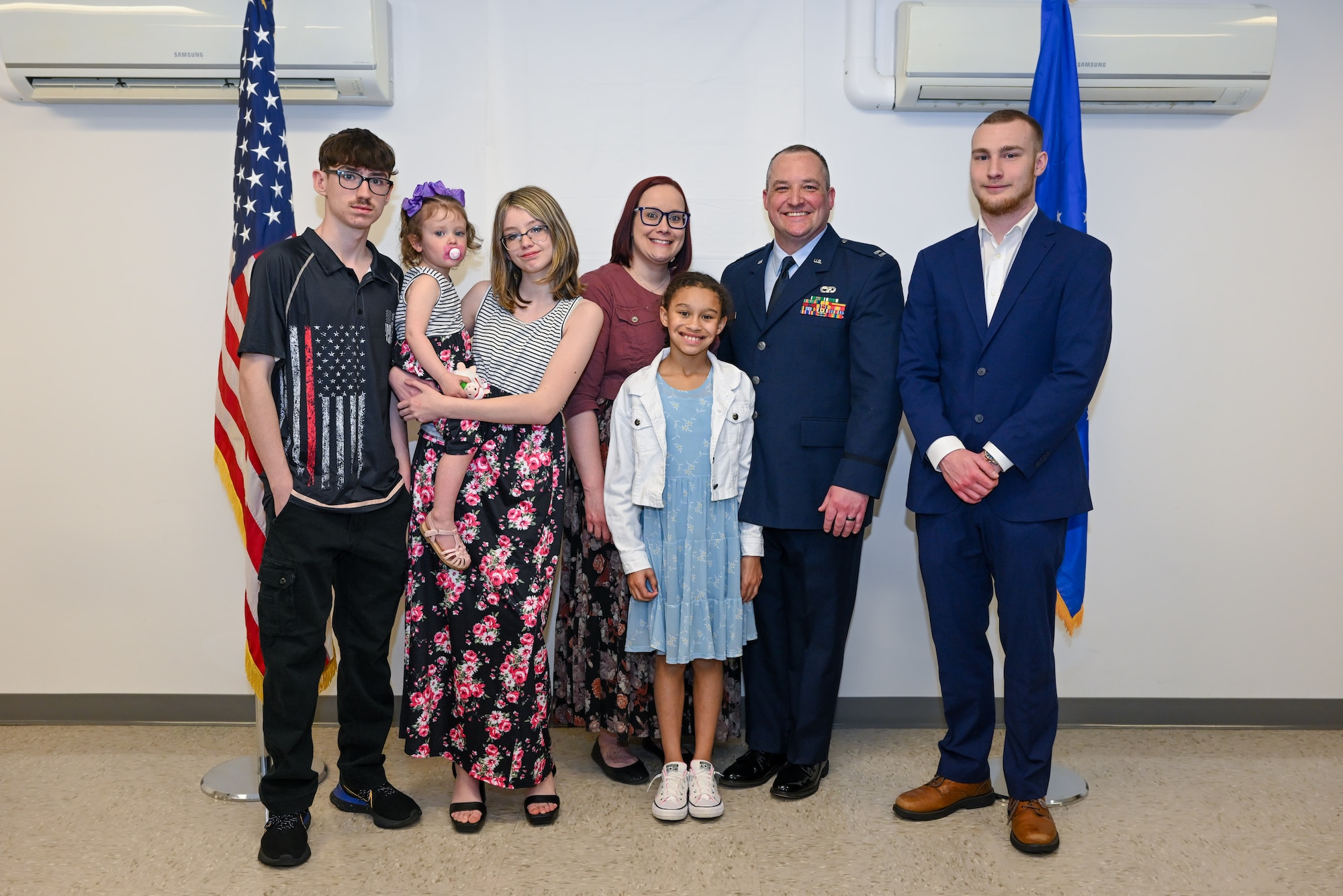 Capt. Jeffrey Kinsey, 910th Logistics Readiness Squadron commander, poses for a photo with his wife and children after his assumption of command ceremony at Youngstown Air Reserve Station, Ohio, April 6, 2024.