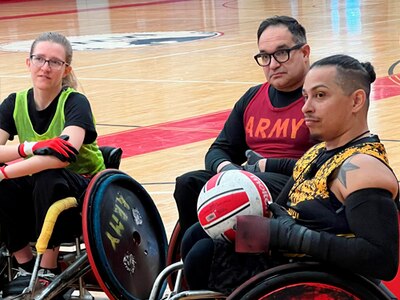 Coach Joel Rodriguez takes questions about a recent drill at the 2024 Wheelchair Rugby Camp.