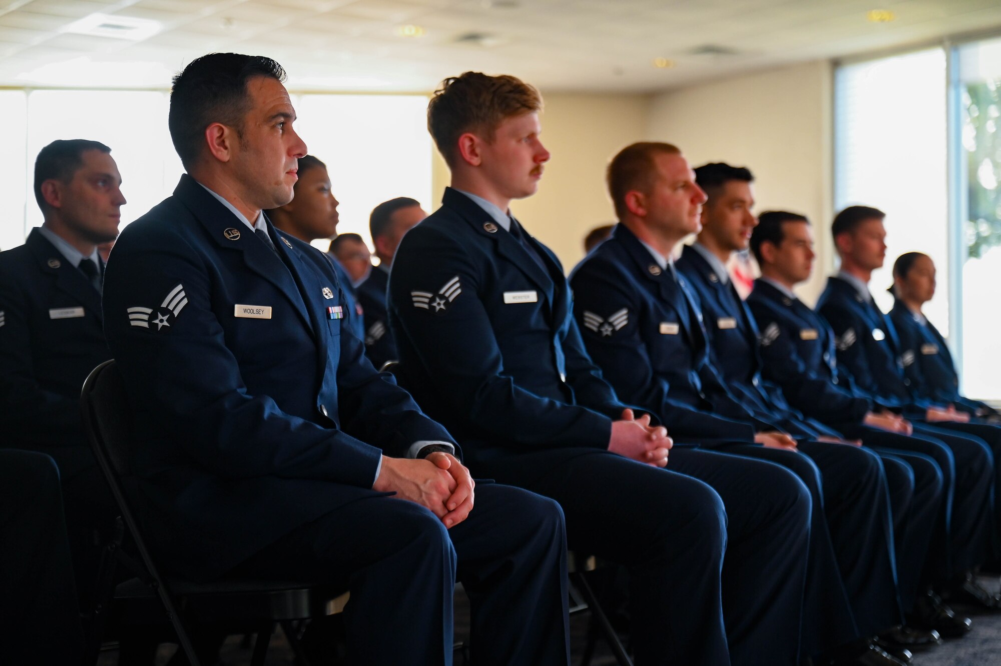 Airmen from across Eglin attend a brief by U.S. Air Force Chief Master Sgt. Will Cupp, 350th Spectrum Warfare Wing command Chief, as part of their introduction to Airmen Leadership School at Eglin Air Force Base, Fla., April 8, 2024. ALS prepares Senior Airmen and Guardians to be professional, war-fighting Airmen and Space Professionals who can supervise and lead work teams as an all-domain joint warfighting professional to support the employment of an Air and Space power. (U.S. Air Force photo by Capt. Benjamin Aronson)
