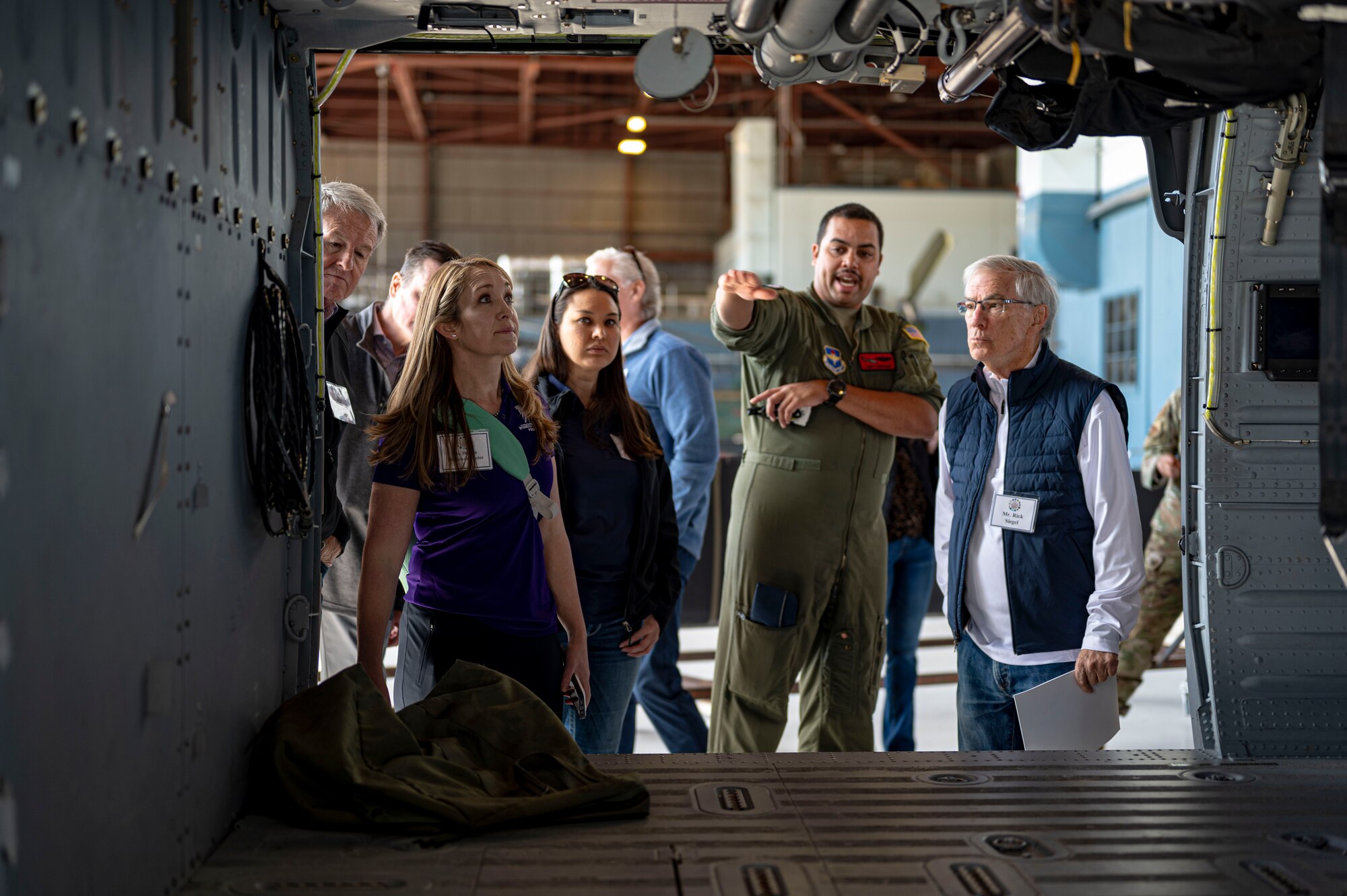 people look inside of a helicopter
