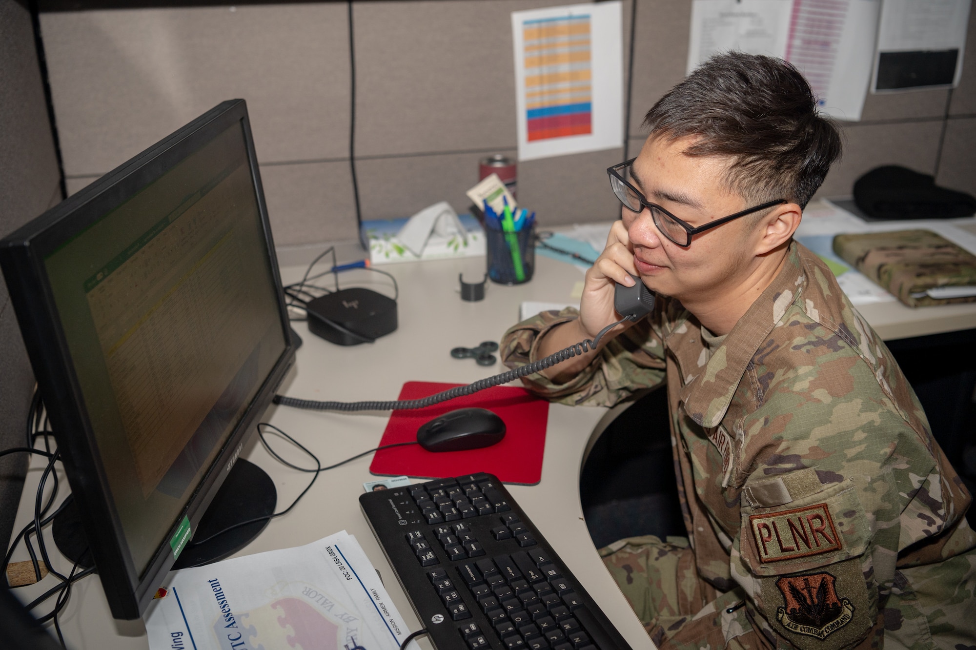 U.S. Air Force Airman 1st Class Jason Yuen, 20th Logistics Readiness Squadron logistics planner, confirms meeting attendance at Shaw Air Force Base, S.C., March 14, 2024. Large operations require participation from multiple units across the wing. Yuen and his wingmen are responsible for facilitating assembly conversations to ensure operations meet mission objectives. (U.S. Air Force photo by Airman 1st Class Kyrii Richardson)