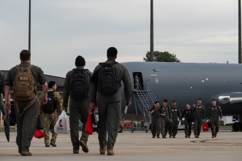 U.S. Air Force members assigned to the 305th Air Mobility Wing prepare for an airborne mobility mission management exercise at Joint Base McGuire-Dix-Lakehurst, N.J., March 15, 2024. Dubbed the "Platform Agnostic Command and Control initiative," this exercise marked a significant leap forward in Air Mobility Command's ability to deliver precision effects swiftly and effectively. (U.S. Air Force photo by Airman 1st Class Aidan Thompson)