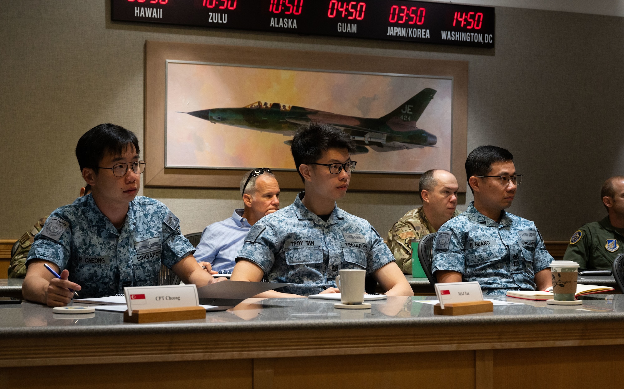 Republic of Singapore Air Force members participate in the Pacific Air Forces-RSAF Dialogue at Joint Base Pearl Harbor-Hickam, Hawaii, April 10, 2024. The PRD is designed to foster military-to-military relationships with Singapore and pave the way for future collaboration. (U.S. Air Force photo by Tech. Sgt. Hailey Haux)