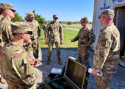 Illinois Army National Guard State Command Sergeant Major, CSM Phillip Barber, tells war stories during the Illinois Army National Guard’s Best Warrior Competition, April 12-14, at Sparta Training Area in Sparta, Illinois.