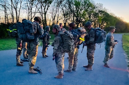 Competitors get ready to start the 12-mile road march during the Illinois Army National Guard’s Best Warrior Competition, April 12-14, at Sparta Training Area in Sparta, Illinois.