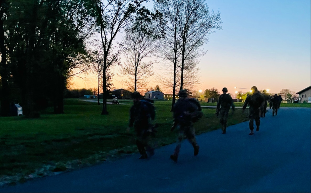 Competitors start the 12-mile road march during the Illinois Army National Guard’s Best Warrior Competition, April 12-14, at Sparta Training Area in Sparta, Illinois.