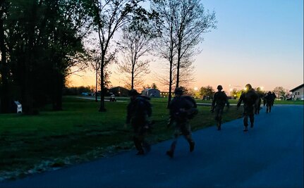 Competitors start the 12-mile road march during the Illinois Army National Guard’s Best Warrior Competition, April 12-14, at Sparta Training Area in Sparta, Illinois.