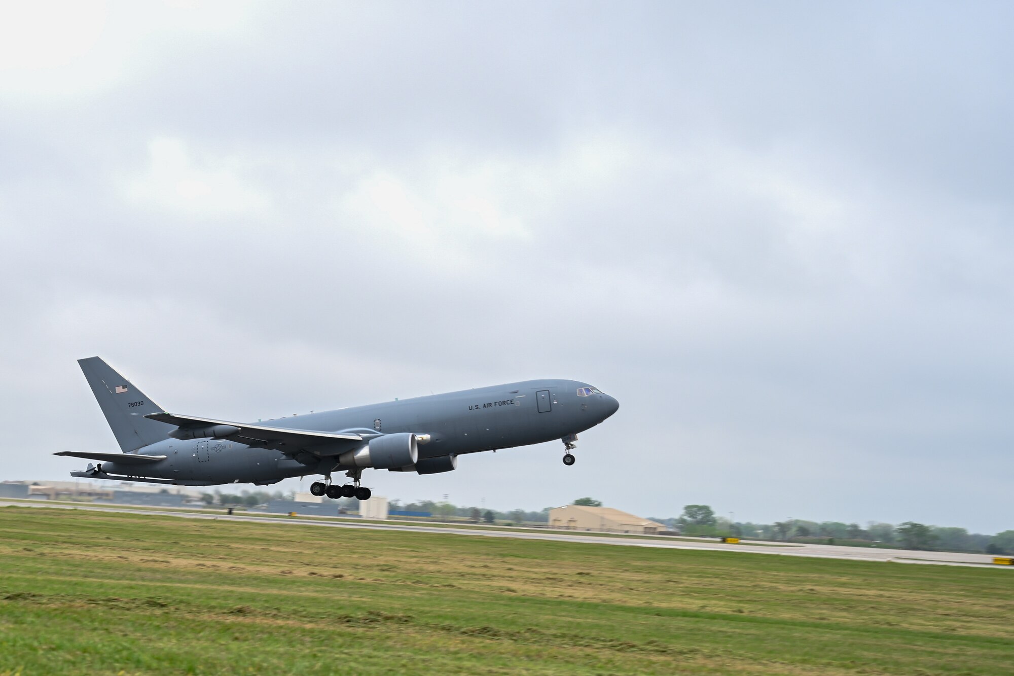 A KC-46A Pegasus takes off from McConnell Air Force Base, Kansas, April 15, 2024. Due to the possibility of high winds and hail, the majority of McConnell’s aircraft left the base for a weather relocation. (U.S. Air Force photo by Airman 1st class William Lunn)