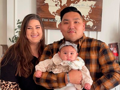 Sgt Mulligan with his wife Kayla and daughter Evyania.