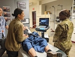 Phase one resident students of the U.S. Army Graduate Program of Anesthesia Nursing demonstrate regional anesthesia and ultrasound skills to the 187th Medical Battalion command team. The USAGPAN is listed as number two in the nation according to U.S. News and World Report. Courtesy photo.