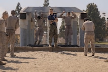 U.S. Marine Corps Sgt. Trace Gresham, a drill instructor with Lima Company, 3rd Recruit Training Battalion, observes recruits conducting the confidence course at Marine Corps Recruit Depot San Diego, California, April 11, 2024. The confidence course allows recruits to become physically and mentally stronger by overcoming obstacles that require strength, balance, and determination. (U.S. Marine Corps photo by Lance Cpl. Alexandra M. Earl)